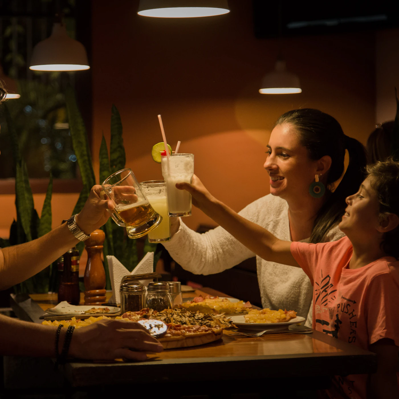 Family sharing dinner at a restaurant
